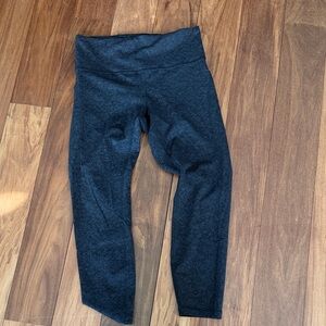 Lululemon wonder train legging with side pocket size 12 black floral EUC